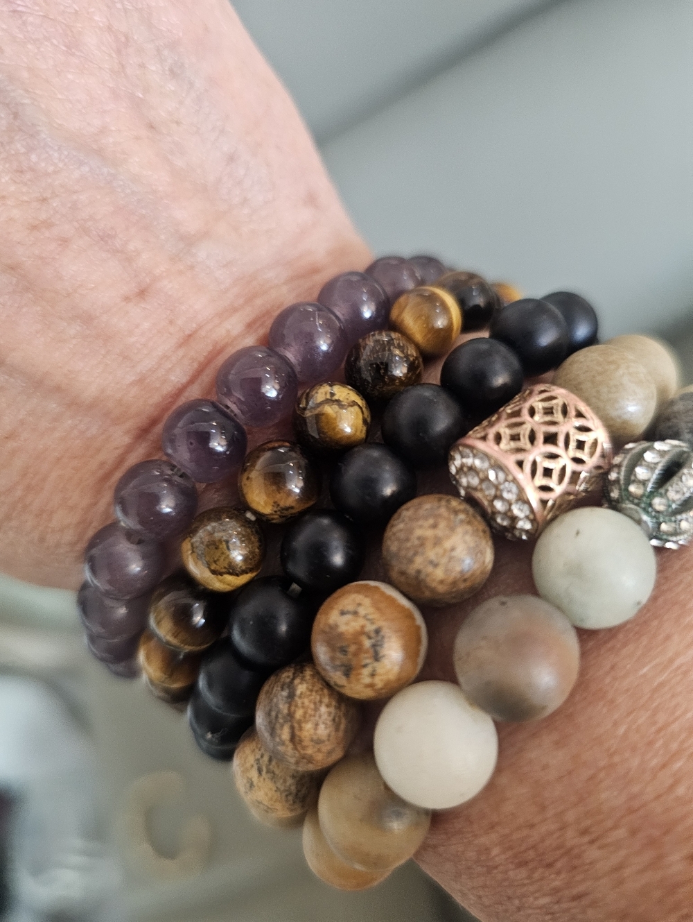 Layered Beaded Bracelet Stack in Purple, Black, Brown and Gold
